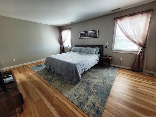 bedroom featuring hardwood / wood-style flooring