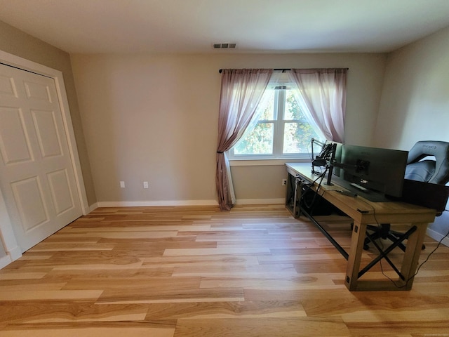 office area with light wood-type flooring