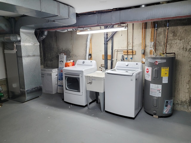 washroom with sink, washer and clothes dryer, electric water heater, and heating unit