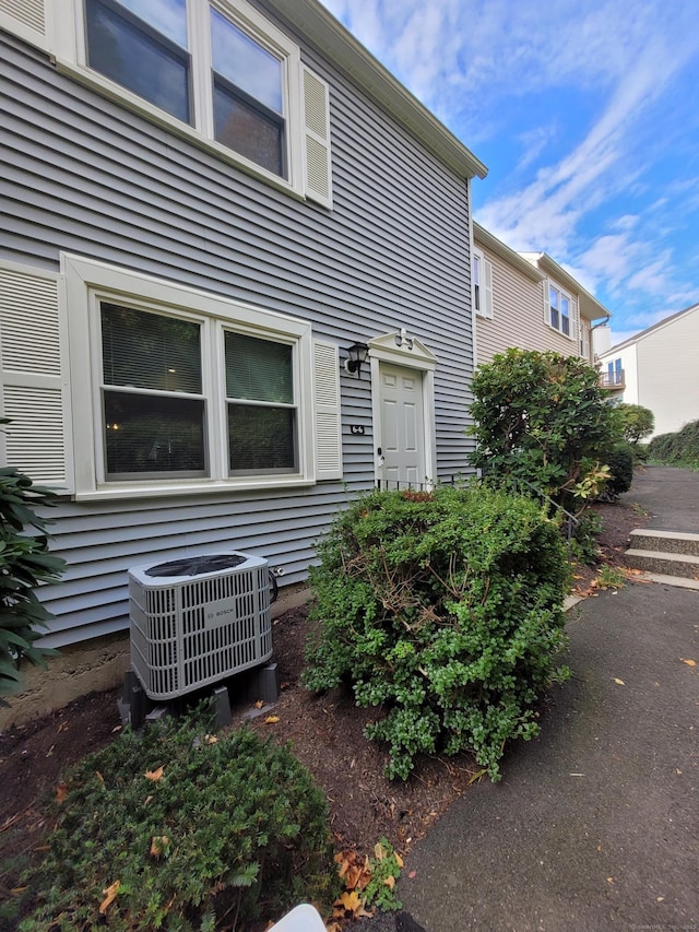 doorway to property with cooling unit