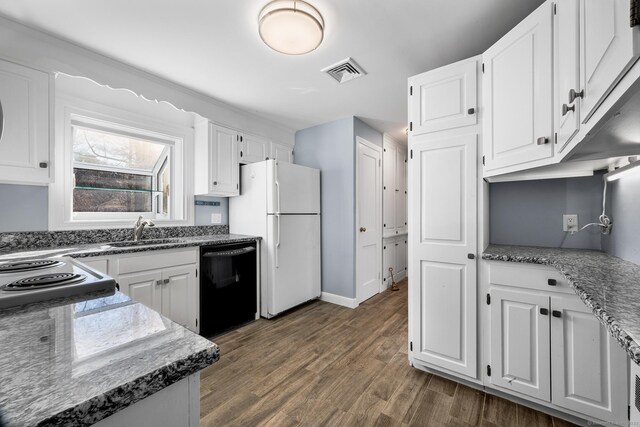 kitchen with white cabinetry, dishwasher, and white fridge