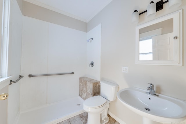 bathroom with sink, crown molding, tile patterned flooring, a shower, and toilet