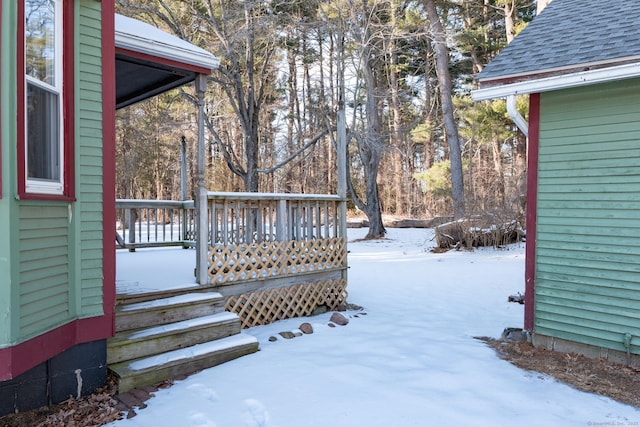 view of snow covered deck