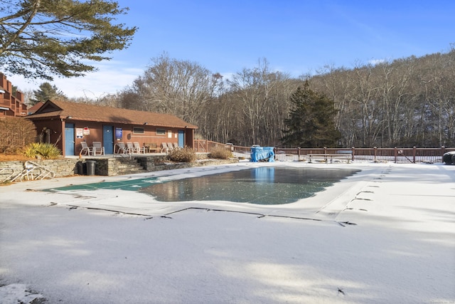 view of pool featuring a patio and an outdoor structure