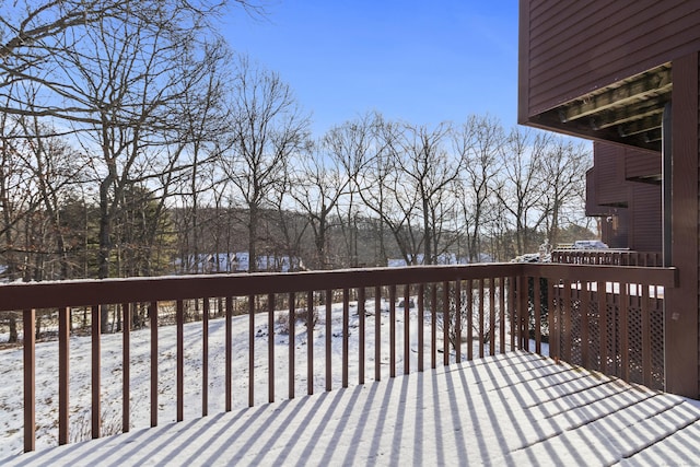 view of snow covered deck