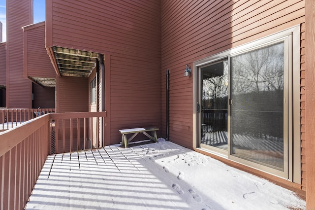 view of snow covered deck