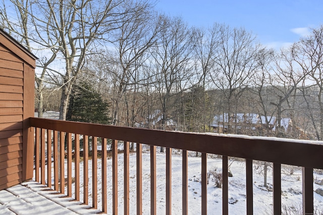 view of snow covered deck