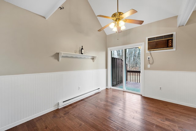 unfurnished room featuring lofted ceiling, baseboard heating, a wall unit AC, and wood-type flooring