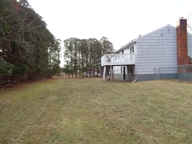 view of yard with a deck