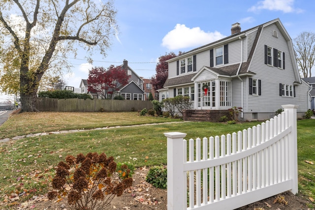 view of front of house with a front yard