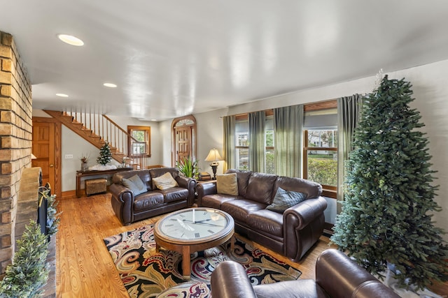 living room with light hardwood / wood-style flooring