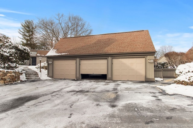 view of snow covered garage