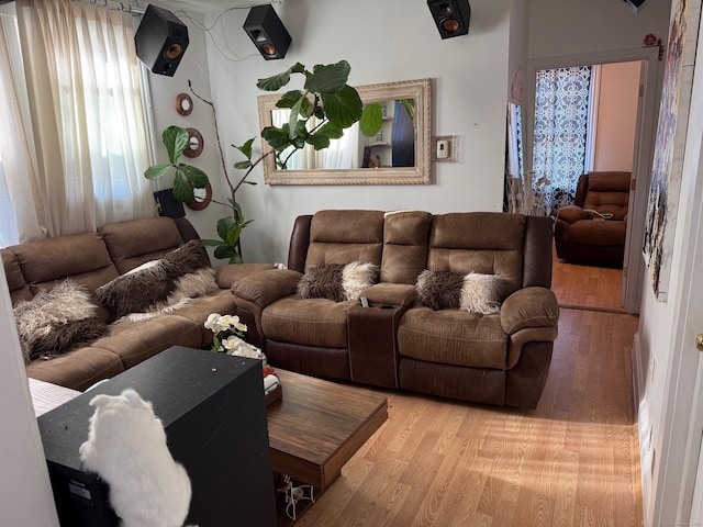 living room with light hardwood / wood-style flooring