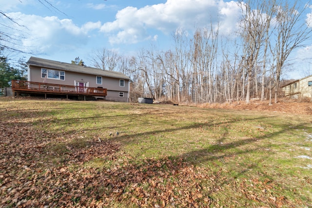 view of yard with a deck