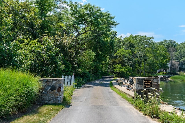 view of road featuring a water view