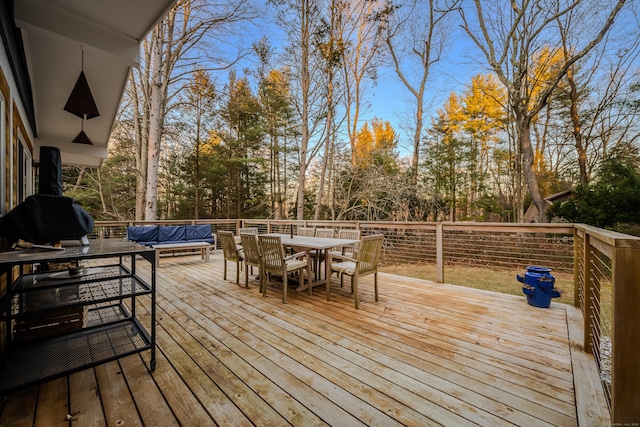 wooden terrace featuring outdoor lounge area