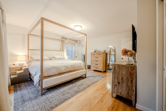 bedroom featuring wood-type flooring