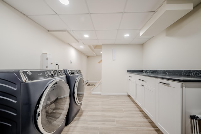 laundry room with washer and dryer