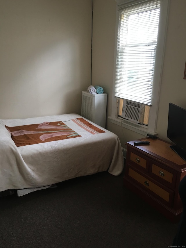 bedroom featuring cooling unit