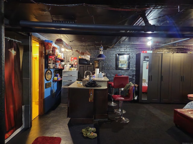 interior space featuring dark brown cabinets