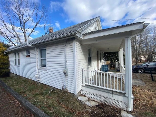 view of home's exterior with a porch