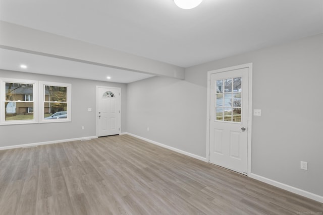 foyer with light wood-type flooring