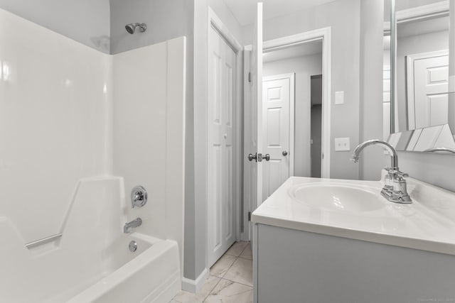 bathroom with shower / bathtub combination and vanity