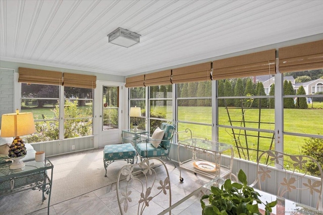 unfurnished sunroom with wood ceiling