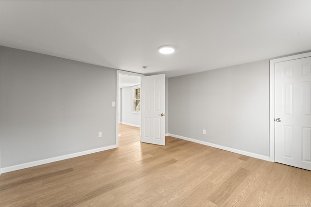 unfurnished room featuring light hardwood / wood-style flooring