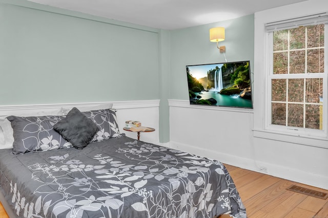 bedroom featuring hardwood / wood-style flooring