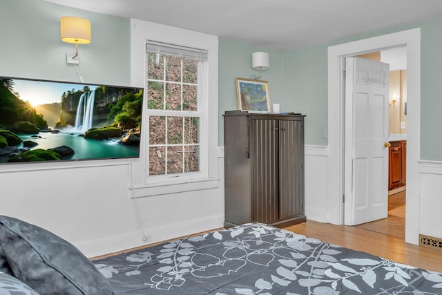 bedroom with light hardwood / wood-style flooring