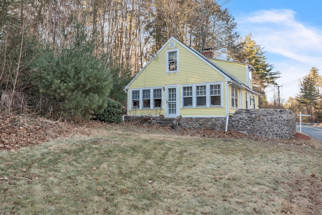 exterior space with a front yard