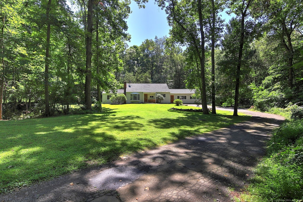 view of front of home with a front yard