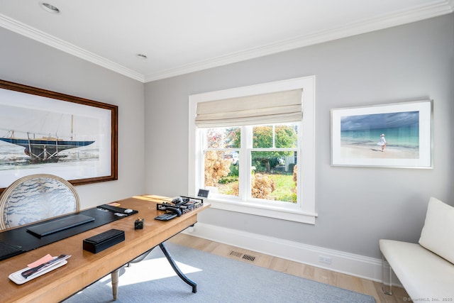 office with crown molding, baseboards, and wood finished floors