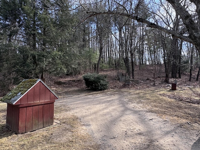 exterior space featuring a shed