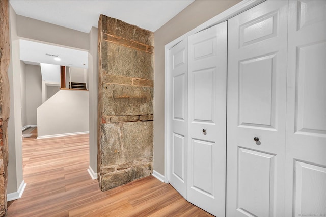 hall featuring light hardwood / wood-style flooring