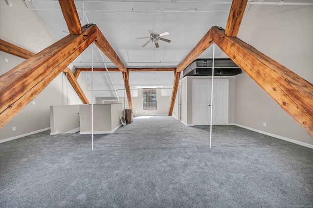 bonus room with carpet floors and ceiling fan