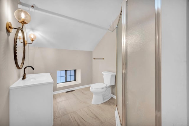 bathroom featuring toilet, vanity, vaulted ceiling, and walk in shower