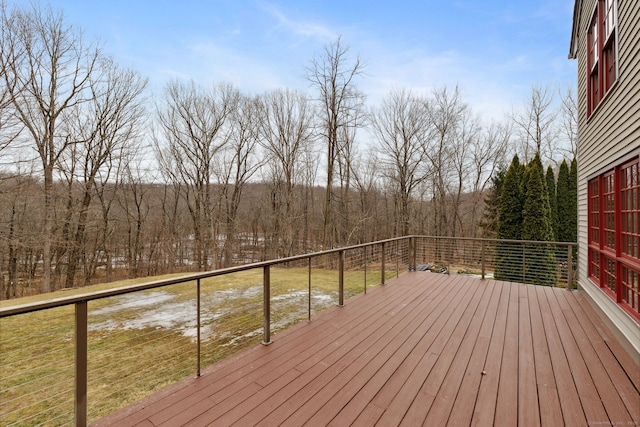 deck featuring a wooded view