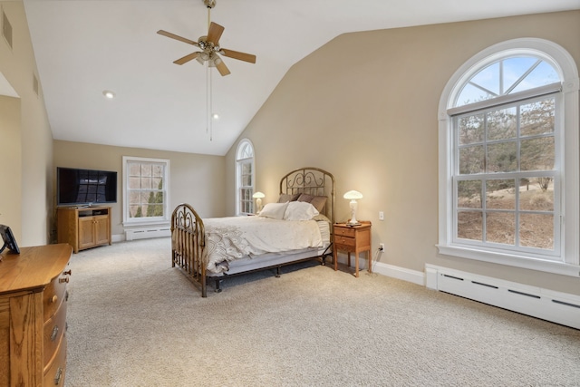 bedroom featuring vaulted ceiling, light colored carpet, ceiling fan, and a baseboard radiator