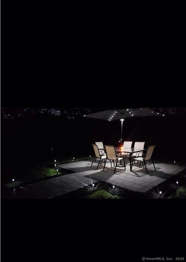 view of patio at night