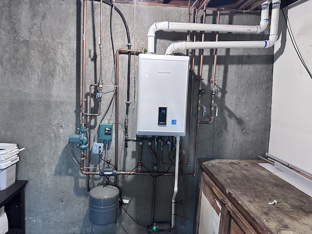 utility room with tankless water heater