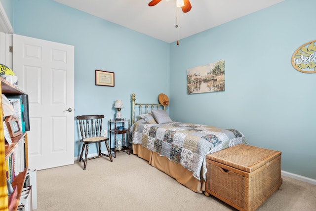 bedroom featuring ceiling fan and carpet flooring