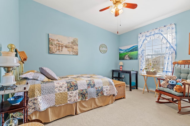 bedroom with ceiling fan and carpet floors