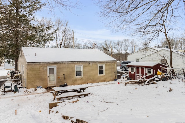 view of snow covered property