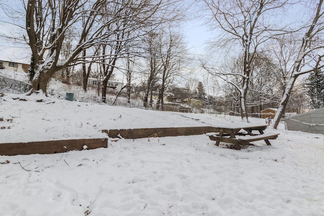 view of yard covered in snow