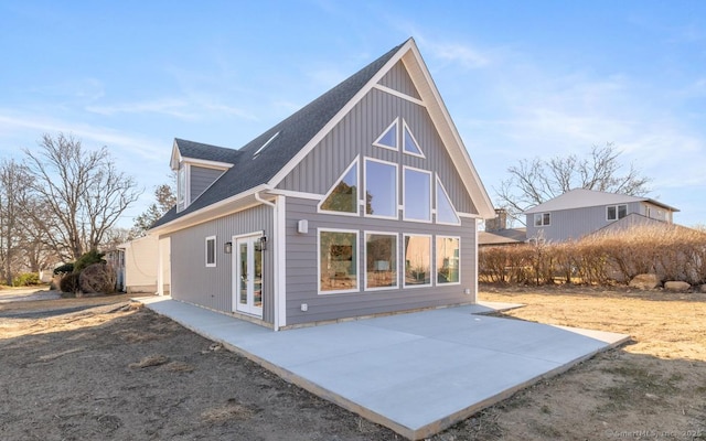 back of property with a patio area