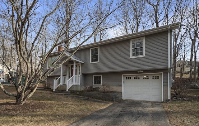 raised ranch with a garage