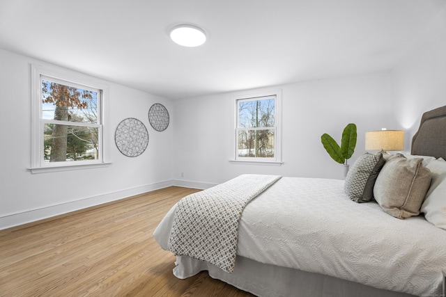 bedroom featuring light wood-type flooring