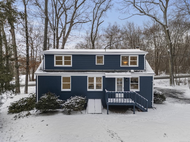 view of front of home featuring a wooden deck